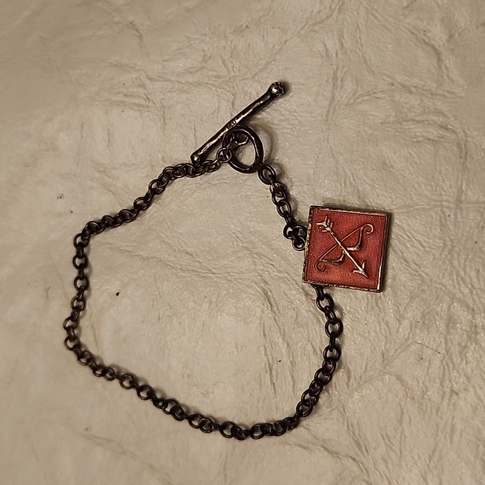 True hearts bow and arrow charm bracelet